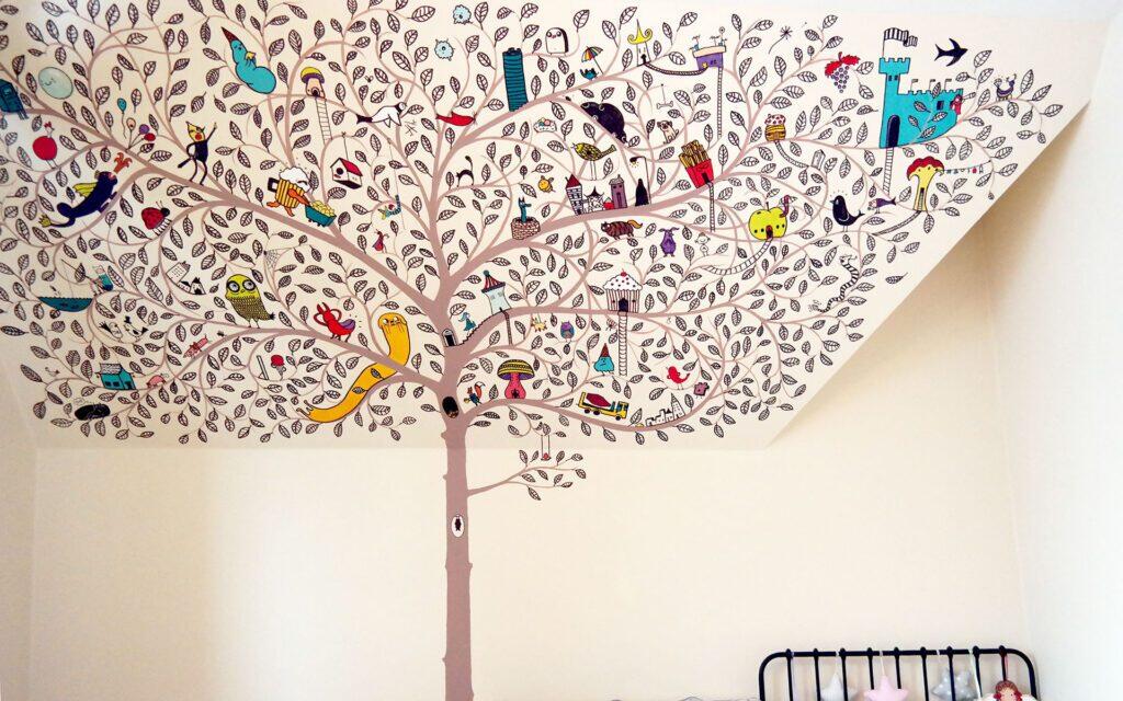 Enchanted Tree mural in a child's bedroom by Kasia Hebda