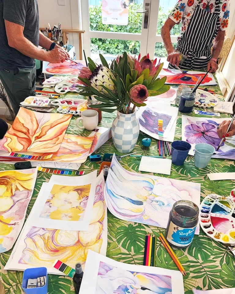Expressive floral watercolours in progress on the studio table during a class with Kasia Hebda