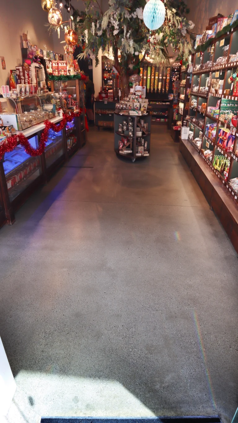 Before - the bare concrete floor of the Remarkable Sweet Shop