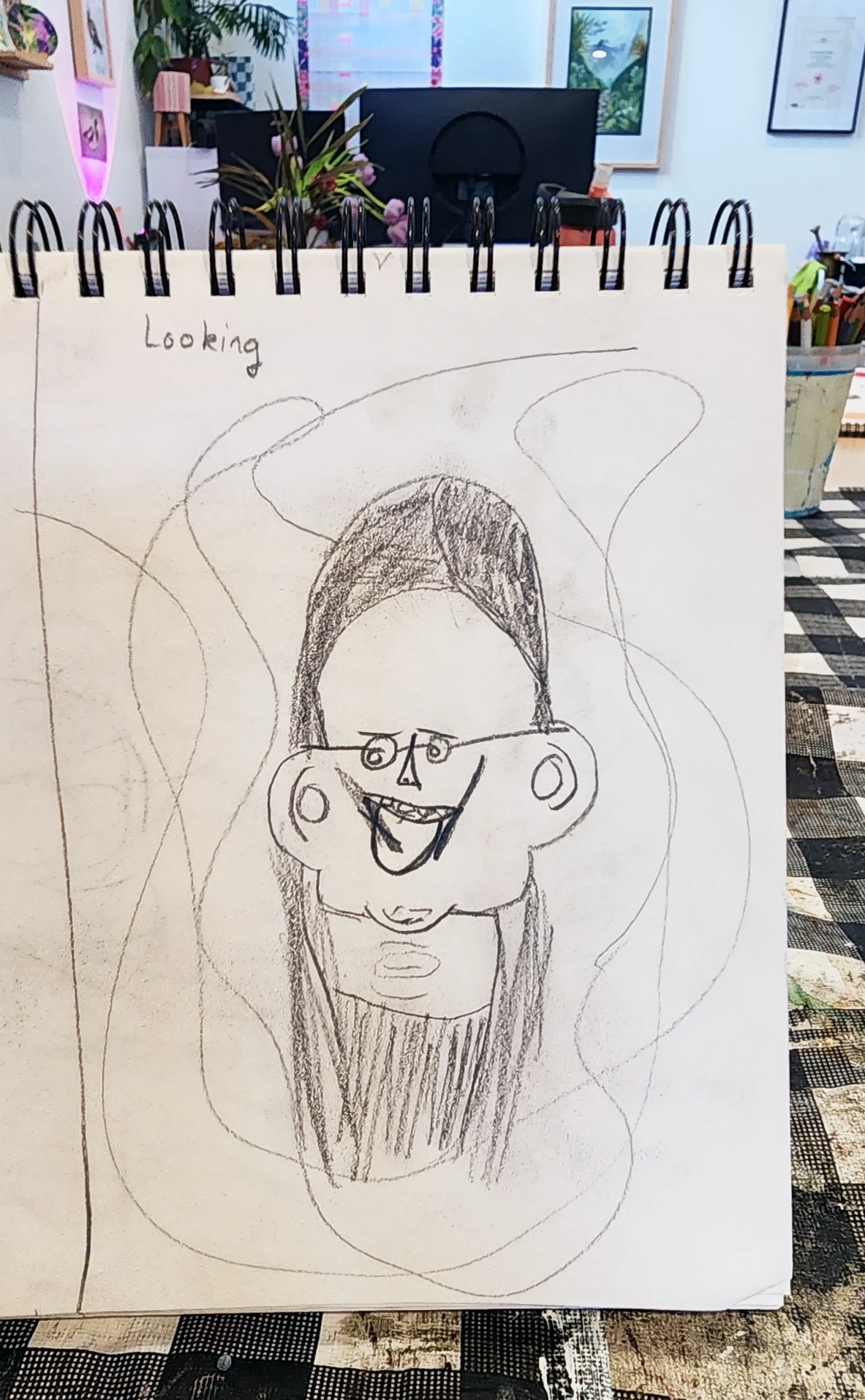 A student's pencil portrait of Kasia, drawn in a sketchbook