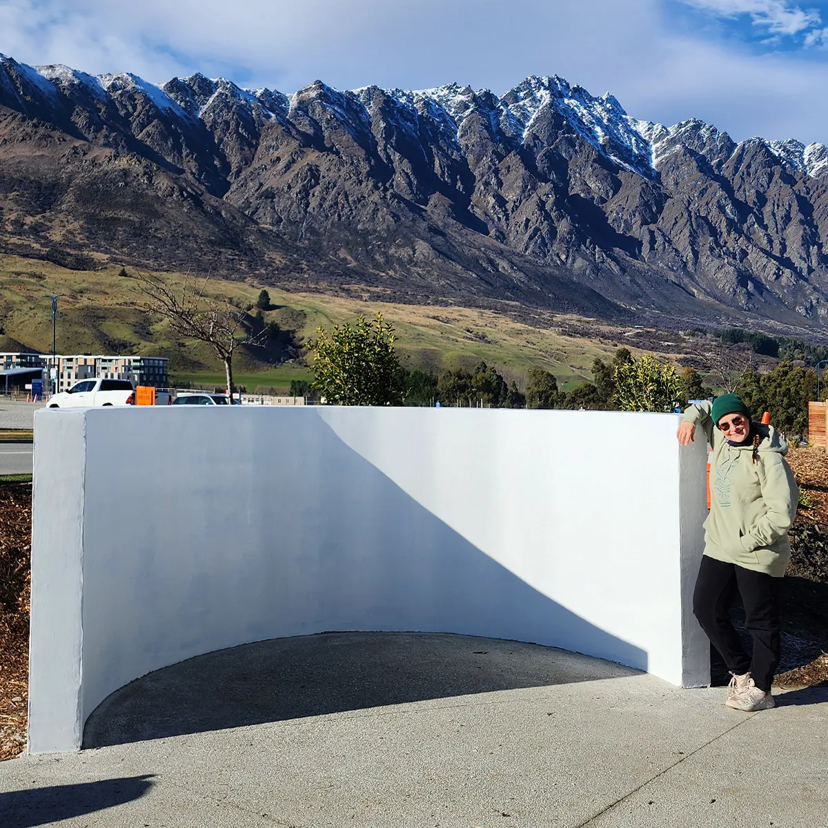 Before - the bare curved wall at Te Atamira, Queenstown, ahead of the mural