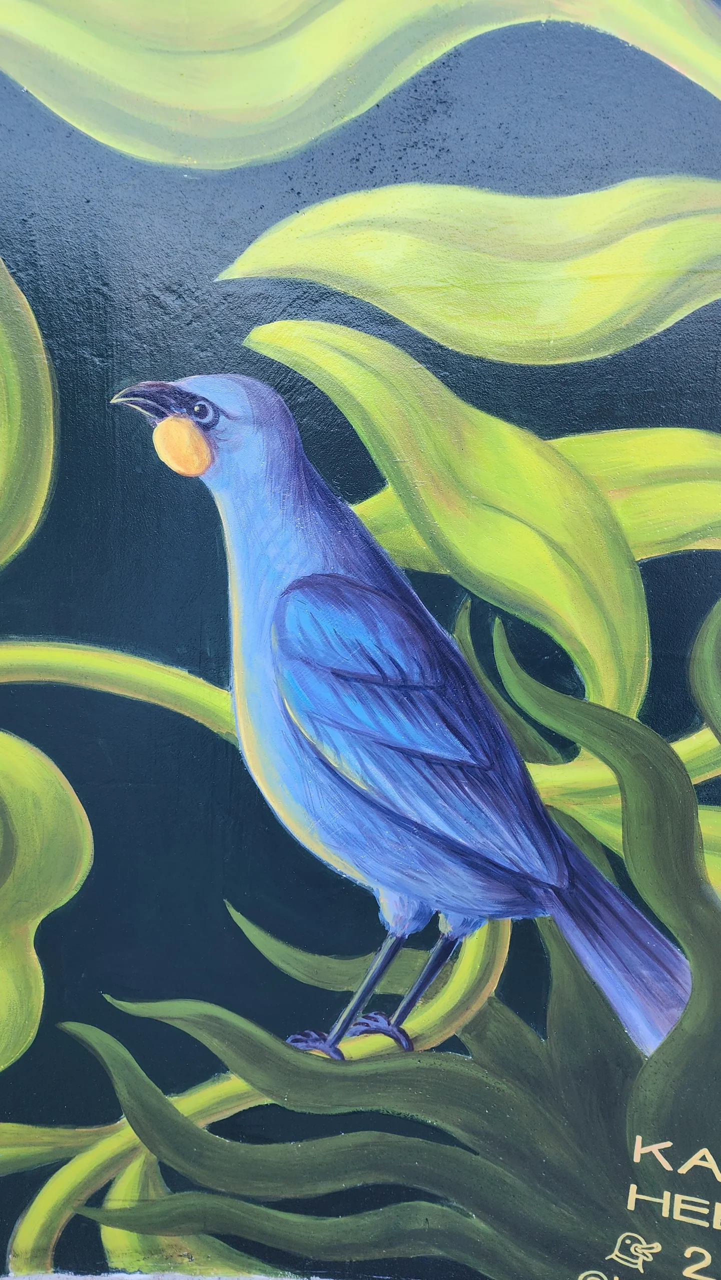 Detail - a blue bird among the green leaves of the Onwards in Art! mural